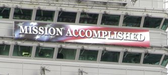 Mission_Accomplished_banner_on_the_USS_Abraham_Lincoln_(CVN-72)_(1).jpg